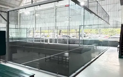 Glass court with the staircase to the upper level